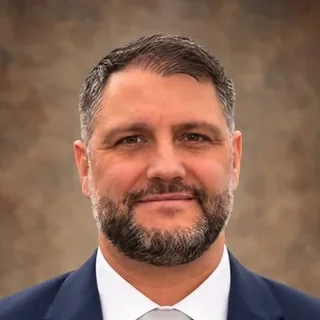 James Tucker, Chief Operating Officer
